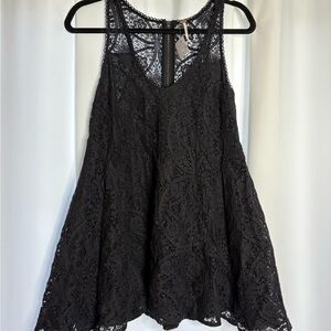 Free people NWT black lace mini dress size XS